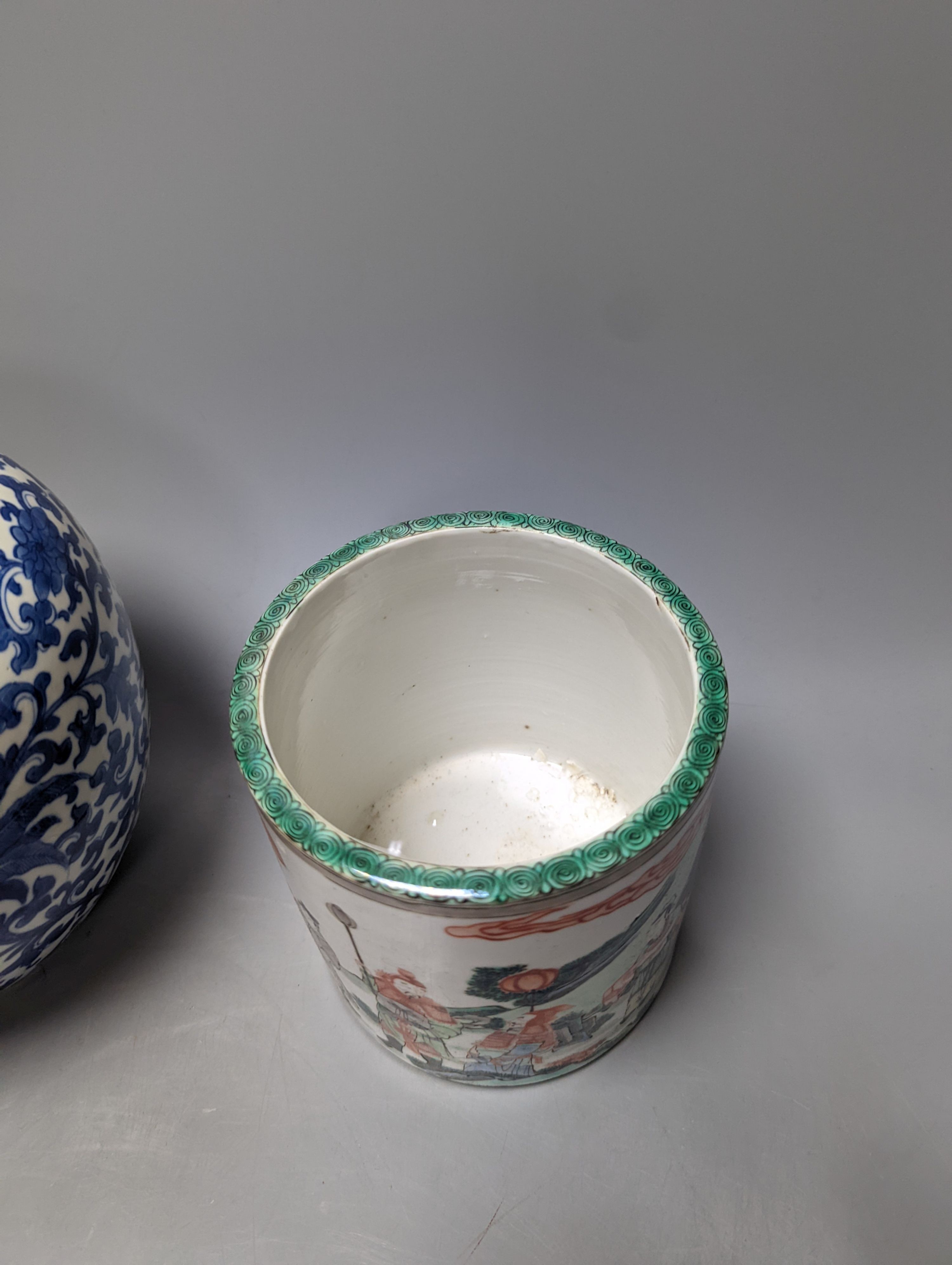 An Imari Japanese dish, a blue and white phoenix jar, and a famille verte brush pot with officials. Largest 29cm diameter